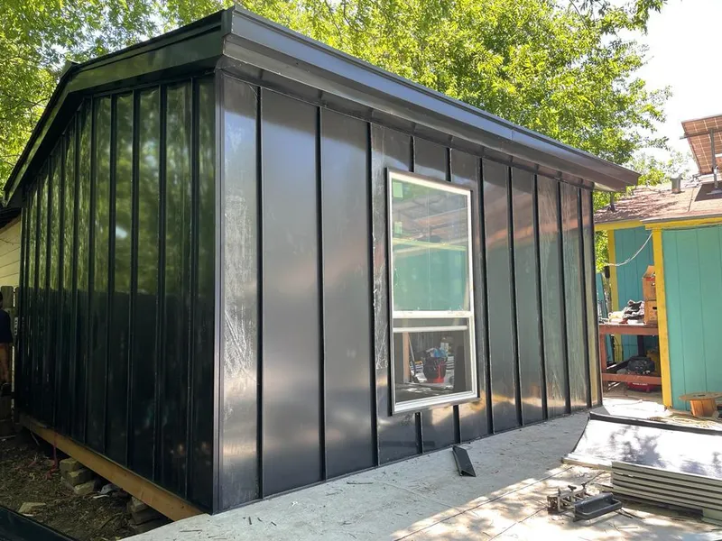 Black standing seam metal wall panels for Metal Roof Installation in Edgartown