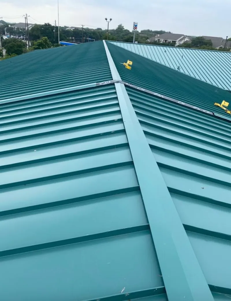 Green commercial metal roof ridge and valley for Metal Roof Repair in Edgartown